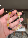 Bracelet Éclat Solaire — Pierre de lave, Œil de tigre, Calcite orange, Cristal de roche jaune & Jaspe dalmatien